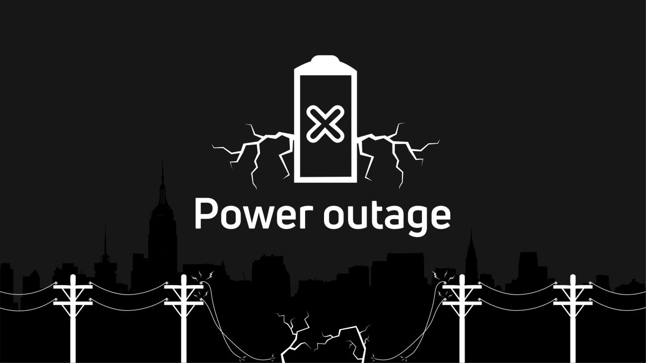 Black graphic with the words "power outage"